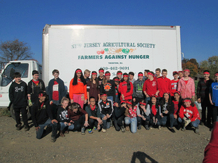 St. Paul students spend day of service farming for food pantries 