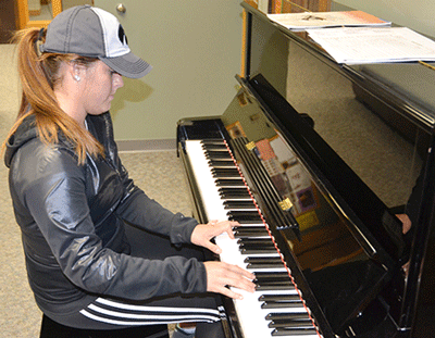 'God moment' leads Iowa teen to compose music for Sandy Hook effort