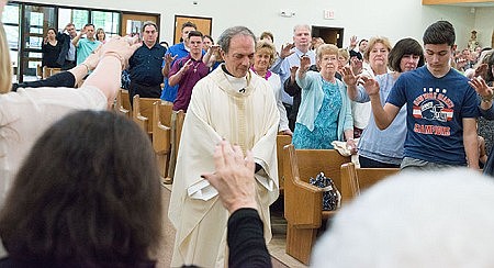 Journey of Surprises --  Father Lang finds inner peace in serving God&#161;&#166;s people 