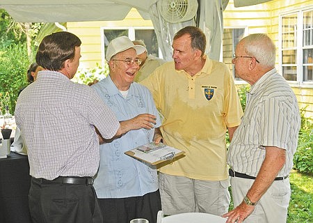 Bishop O'Connell acknowledges retired priests of the diocese for a job well done