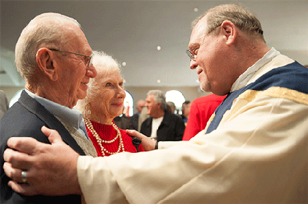 At Mass, Bishop O'Connell salutes married couples marking milestone anniversaries in 2014