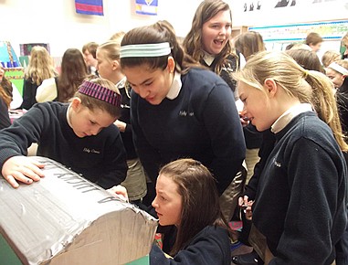 Holy Cross students hold 'Cardboard Arcade' fundraiser for Africa