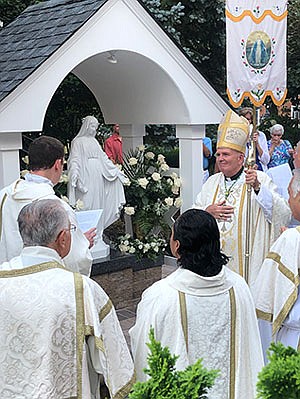 Bishop O'Connell celebrates Assumption Masses; prayer grotto blessed in Hamilton parish