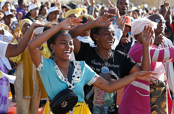 Change the world, don't just gripe about it, Pope tells young people