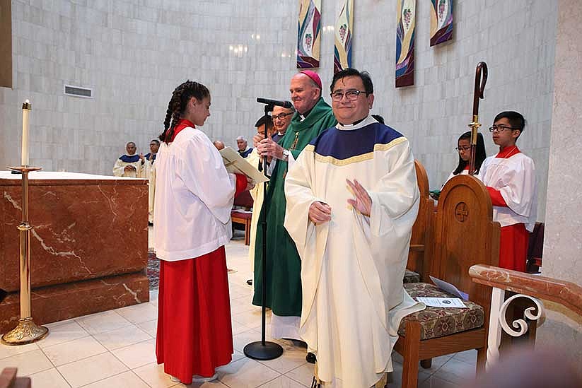 Bishop installs Father Sumanga as pastor of Hightstown parish