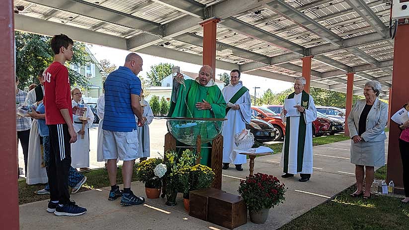 Lawrenceville parish cares for creation by building solar panel bridge