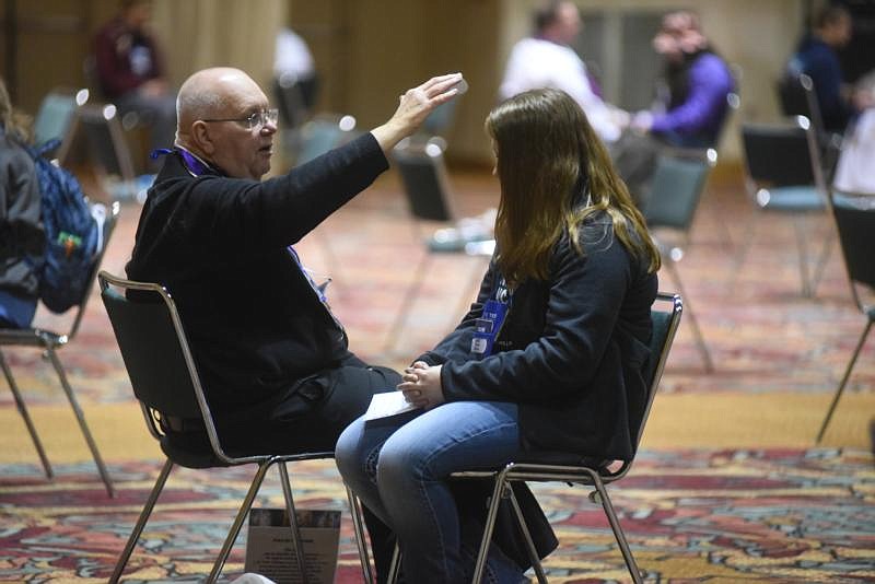 Confession is 'highlight' of NCYC as hundreds of priests share God's mercy