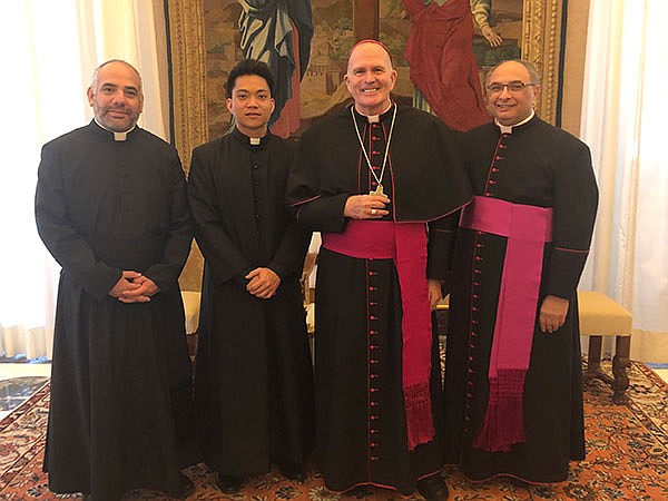 In Rome, Bishop part of discussions on clergy, real presence 