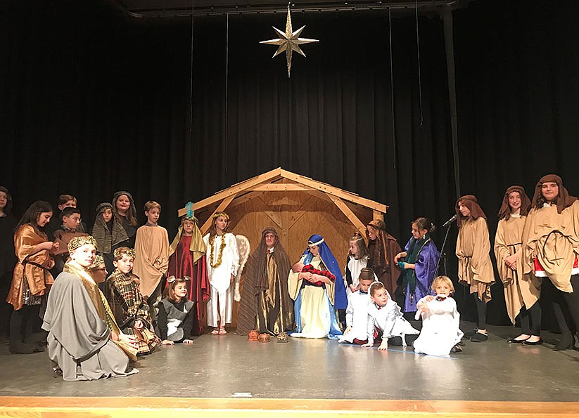 Holy Cross school’s Christmas play brings together those of all ages