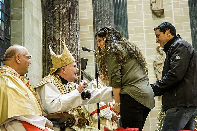 Faithful, families find inspiration during Christmas Masses with Bishop