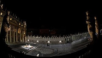 Pope leads Way of the Cross in empty, torch-lit St. Peter's Square