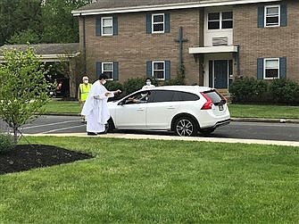 Bishop O'Connell announces approval of 'in car' Masses, distribution of Eucharist