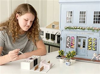 Catholic schoolgirl garners national attention for her dollhouse business