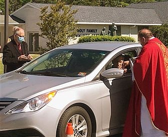 Parishes mark Pentecost with in-car Masses