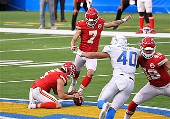 For Chiefs' star kicker, his Catholic faith and family are his priority