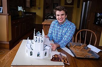 College student creates gingerbread cathedral, raises money for homeless