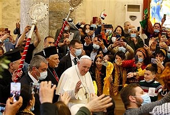 Returning from Iraq, Pope talks about 'risks'