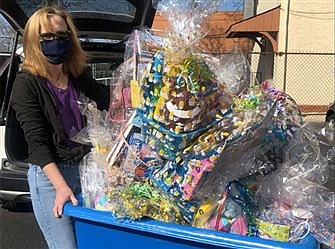 Area parish donates Easter baskets to Mount Carmel Guild