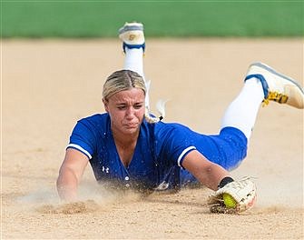 Focused and grounded Donovan Catholic softball team is good as ever