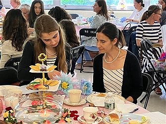 Mothers, daughters address feminine topics in Manasquan parish tea