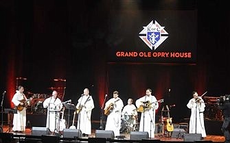 Hillbilly Thomists bluegrass band performs for Knights on Opry stage