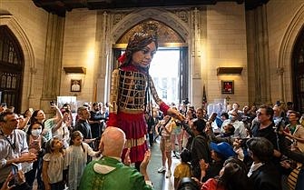 Giant puppet of Syrian refugee girl makes stop at St. Patrick's Cathedral