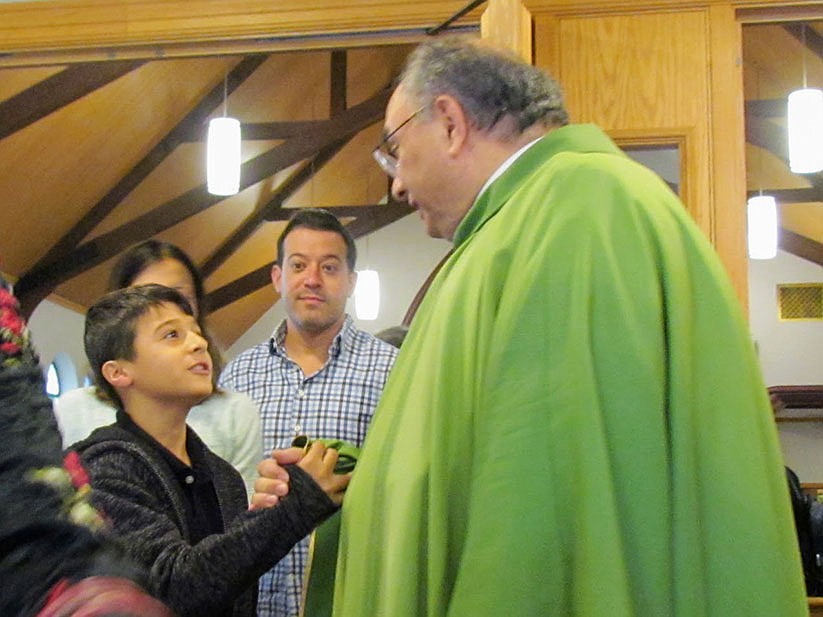 Religious education students honor pastor on 40th anniversary of priesthood