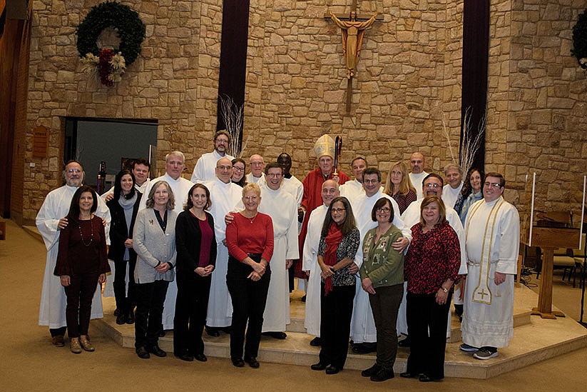 Bishop installs 12 deacon candidates into Ministry of Acolyte