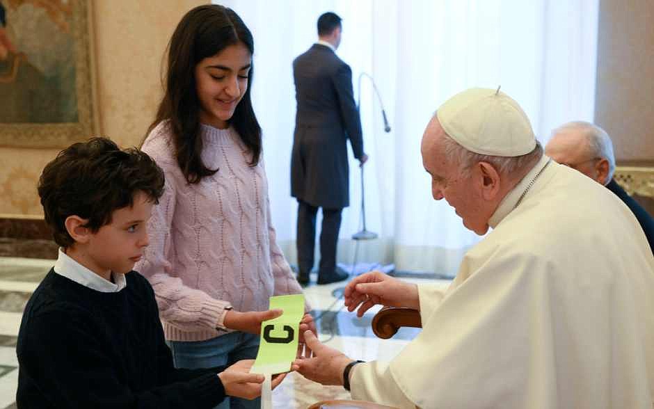 Put down the phone, look to God, look at others, Pope tells kids