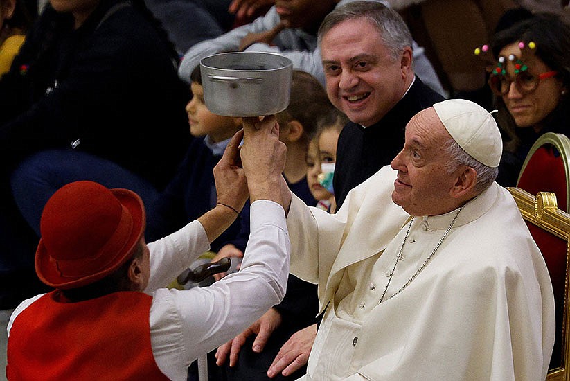 Kids help Pope celebrate 86th birthday with cake, circus performers