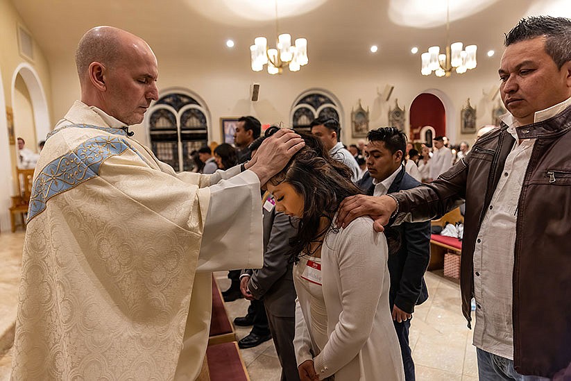 At Easter Vigil, Red Bank parishioners reminded that Jesus brings light to all