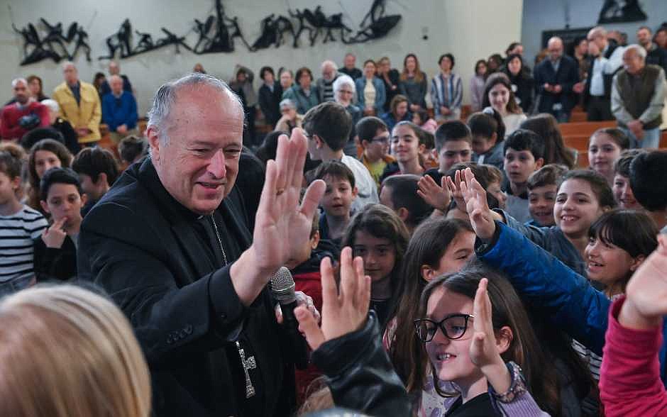 Cardinal McElroy formalizes bond with Rome parish with Mass, high-fives