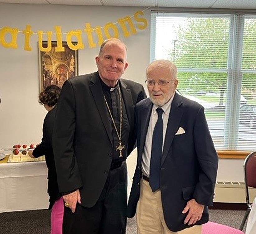 Harry Hill honored for decades of service as diocesan attorney