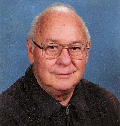 Deacon John Grussler, longtime high school educator